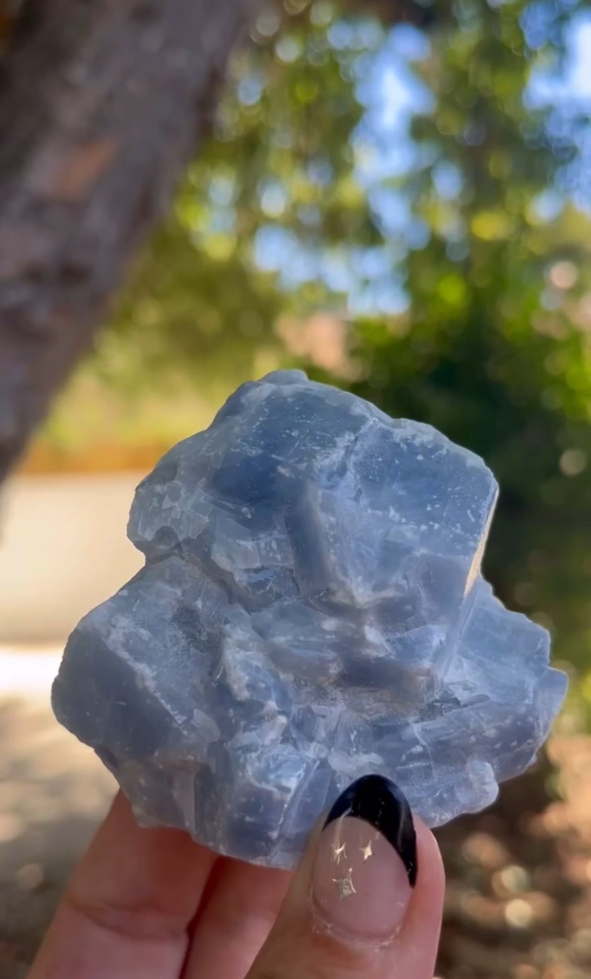 Blue calcite raw healing crystal hand held