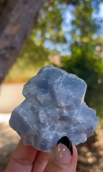 Blue calcite raw healing crystal hand held