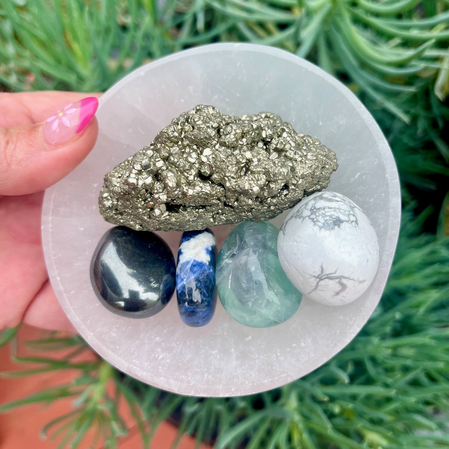 Selenite crystal charging bowl with 5 crystal pack with healing stones hematite, pyrite, white howlite, green fluorite and sodalite.